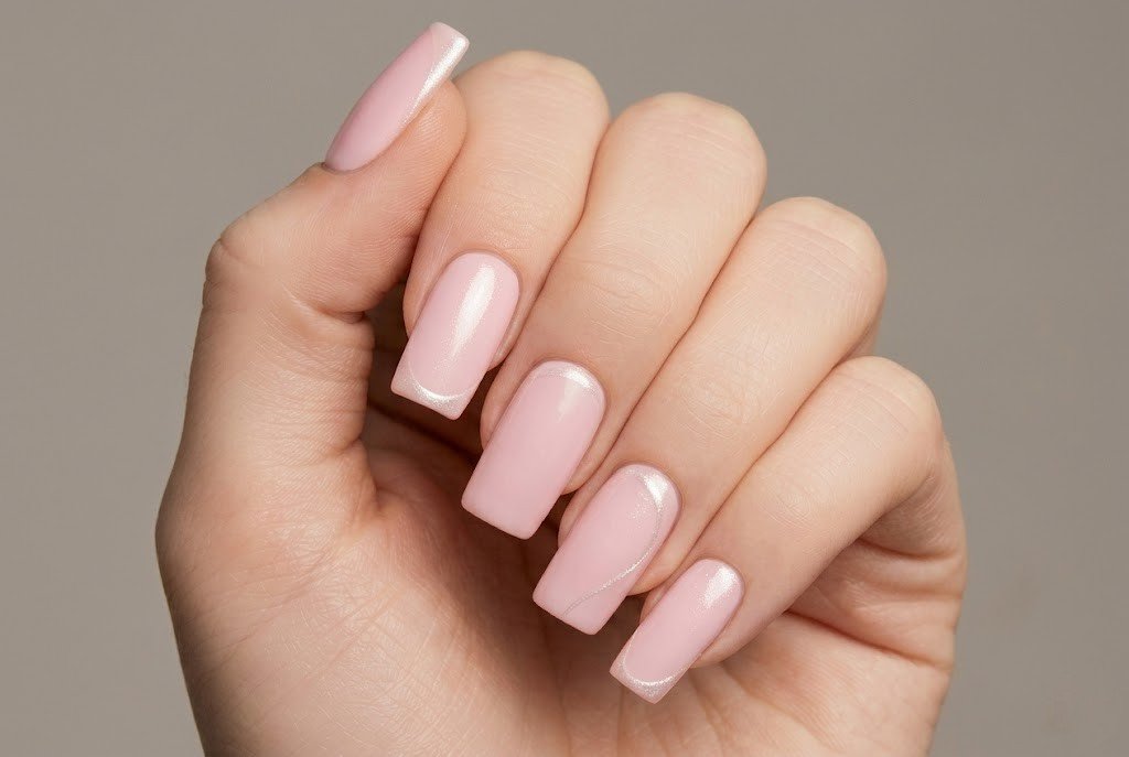 nude pink acrylic nail tips for beginners close up