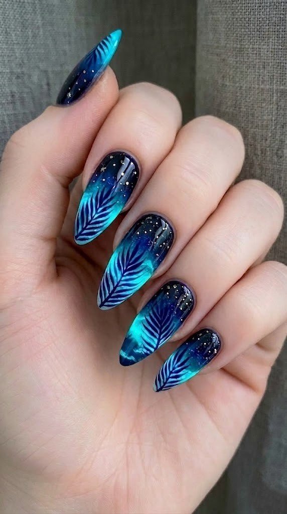 bioluminescent palm silhouette beach nails with neon turquoise and galaxy glitter on almond nails