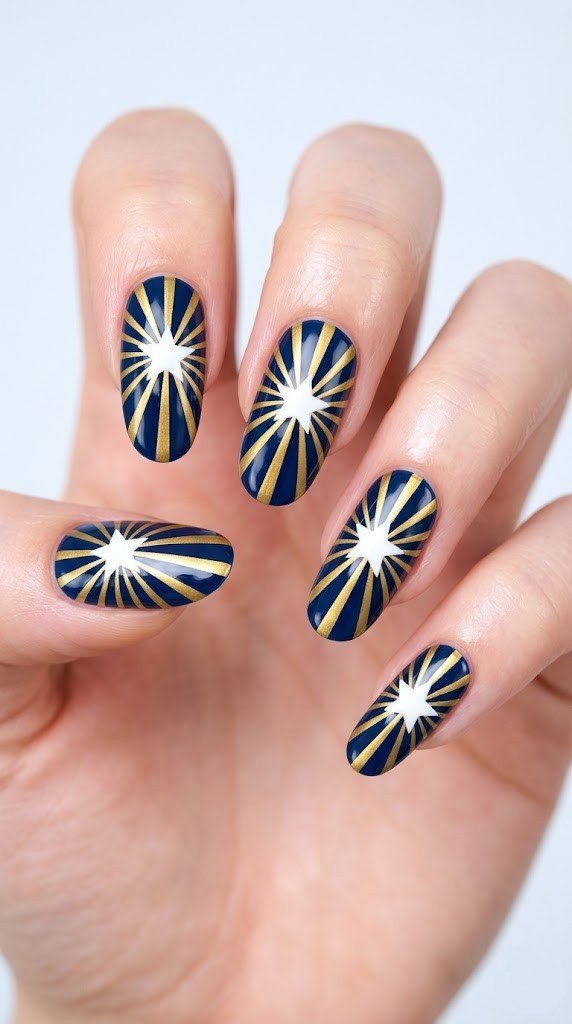 geometric navy gold starburst nails with white center star on elegant oval 4th of july nails