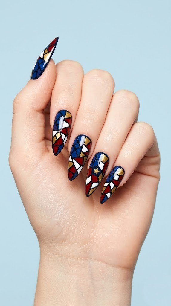 stained glass mosaic 4th of july nail art in red navy gold with geometric patriotic pattern