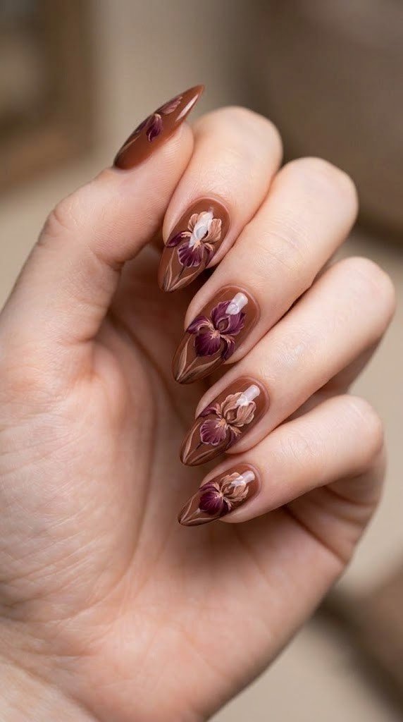 Cinnamon brown fall nail ideas with blooming iris florals in berry tones"