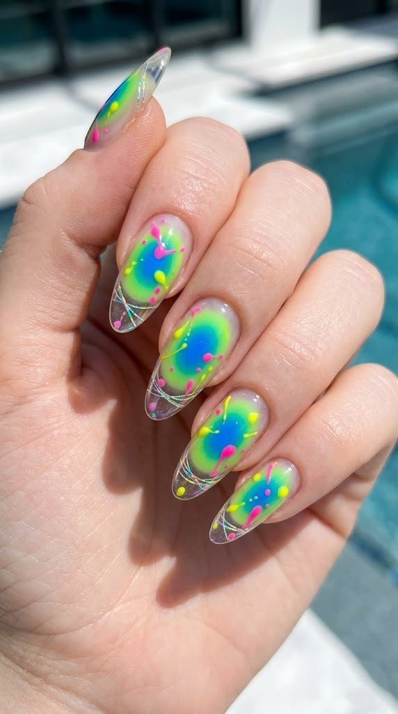 Clear glass nails with blue-to-neon-green aura gradient 3D pink gel drops and silver holographic lines