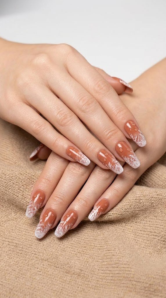 Terracotta clay nails fade into a frosted white tip, capturing classy nail designs for fall.