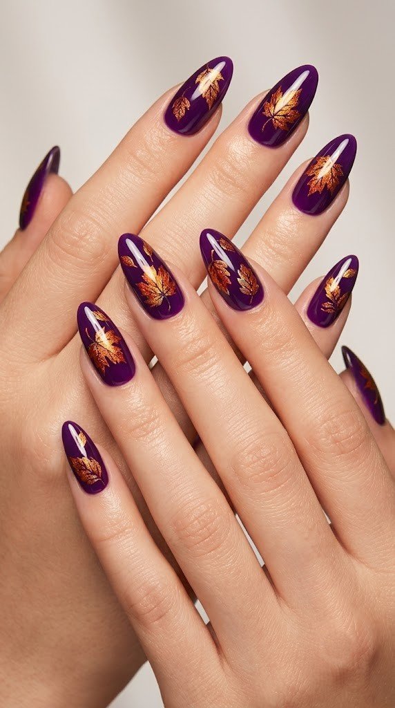 Fig plum almond nails with holographic falling leaves for fall nail colors